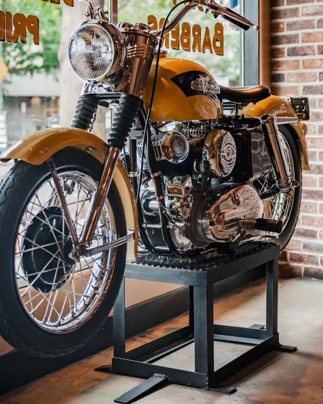 A vintage motorcycle in the front window