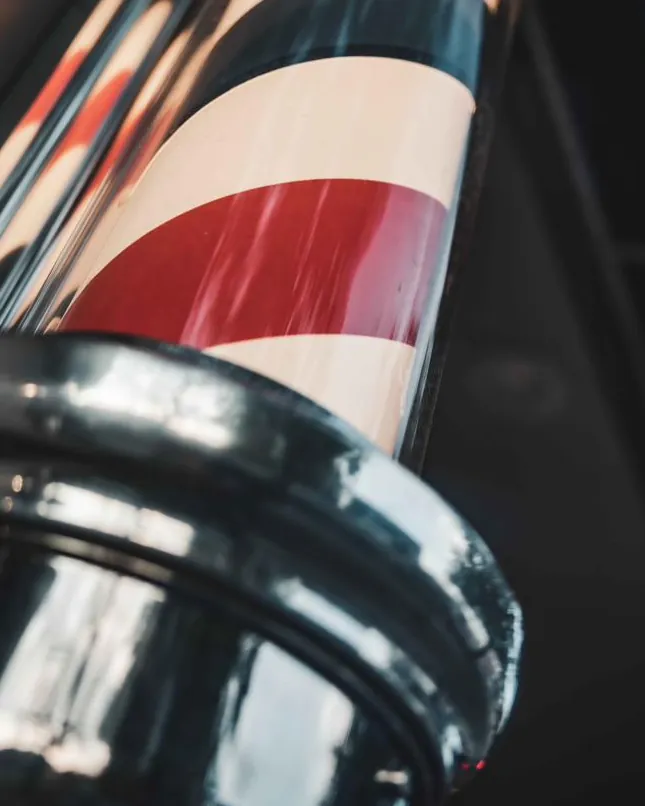 A red, white and blue barber pole