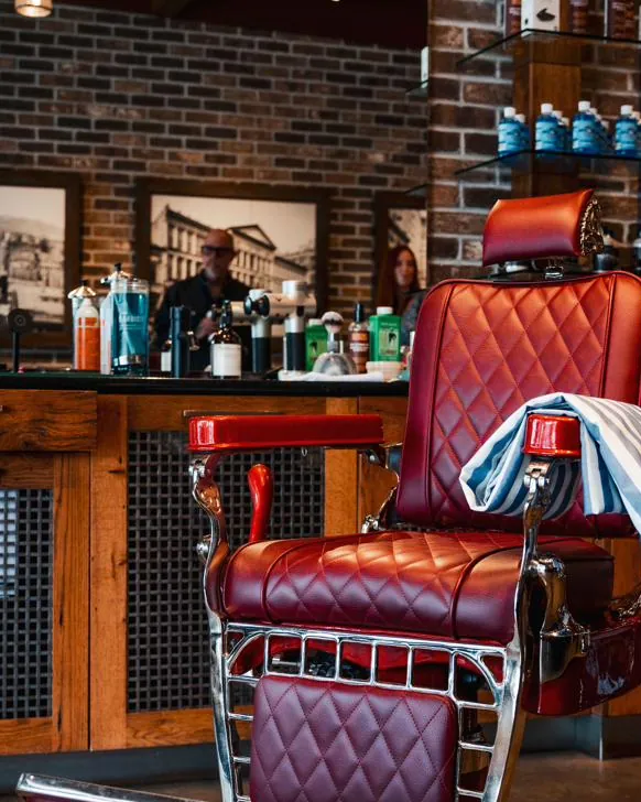 A red leather barber chair